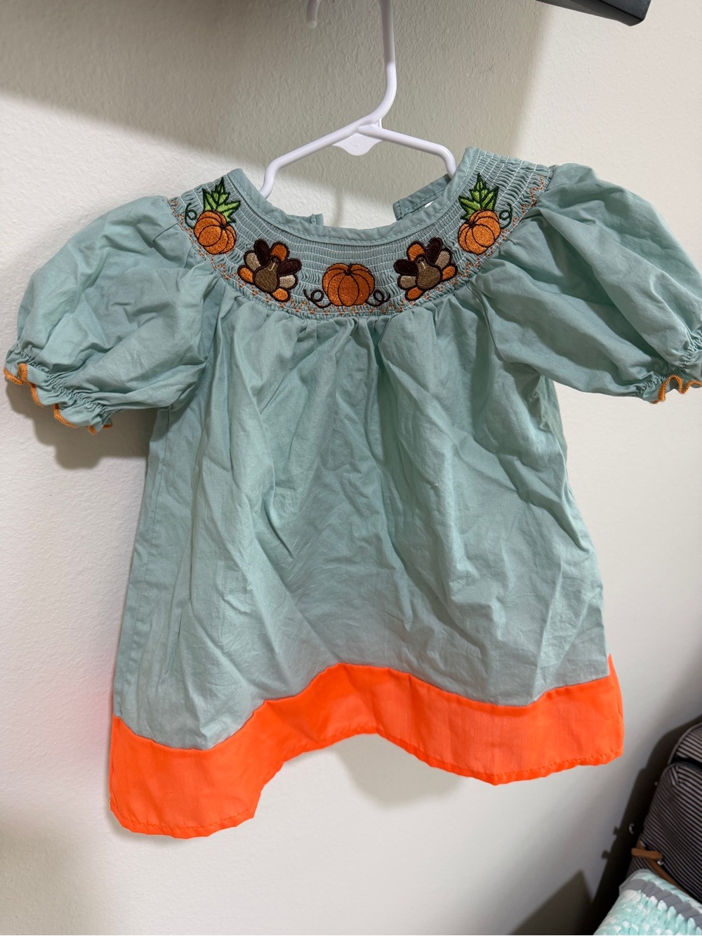 Toddler Girls Smocked Dress with Pumpkin Embroidery and Bright Orange Hem